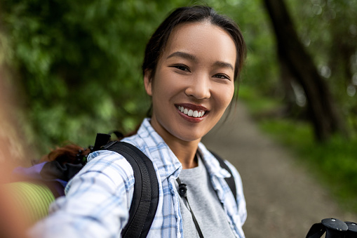 Asian woman on a hiking adventure