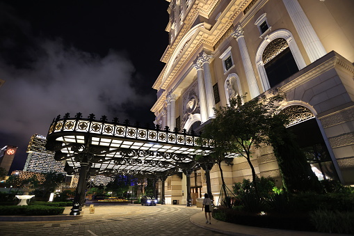 Macau, China July 2 2023: exterior of Grand Lisboa Palace at night. it is the newest casino and hotel in Macau