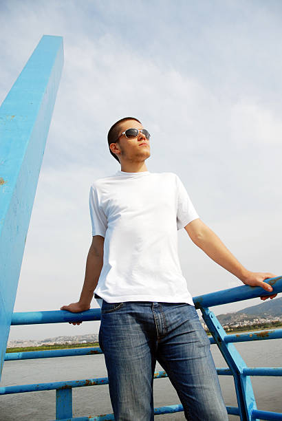 istock posing outdoors in the young man standing 151617067