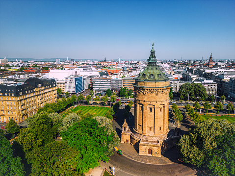 Cityscape of Mannheim, Baden-Württemberg, Germany. Friedrichsplatz with the Mannheim Water Tower (Wasserturm) in the foreground