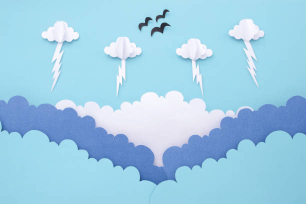 istock Sky with clouds and lightning made of paper cut. 1516173102