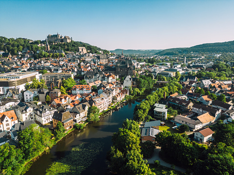 Esch-sur-Sure, Luxembourg - 4 June, 2022: drone view of the picturesque village of Esch-sur-Sure on the Sauer River in northern Luxembourg