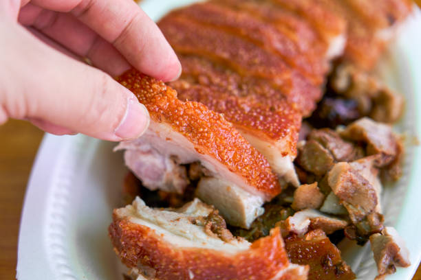 Freshly baked crispy suckling pork, a whole pig with crispy skin