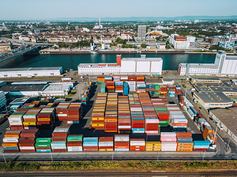 Aerial view of cargo containers, stacked cargo containers \nMannheim,  Baden Wurttemberg, Neckar river, Germany
