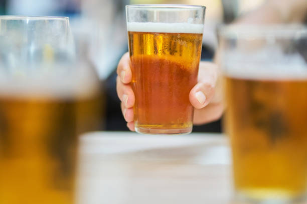 istock an unrecognizable person drinking a cold beer 1516194240