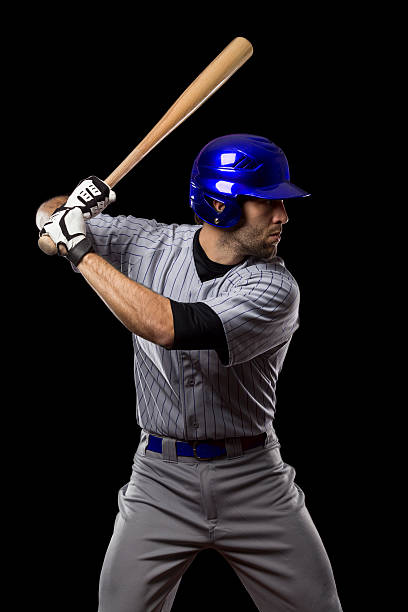 istock Baseball player batting in gray stripe uniform & blue helmet 151620869