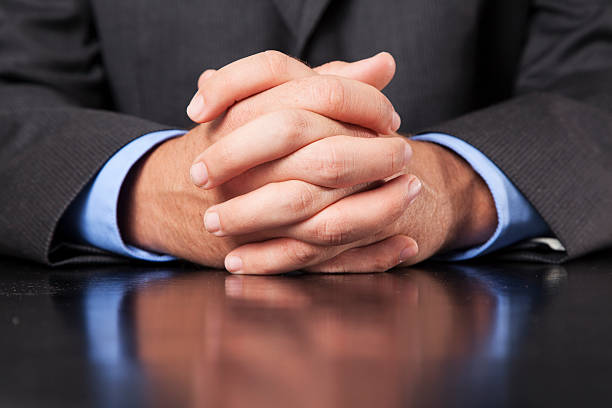 Businessman Hands Clasped stock photo