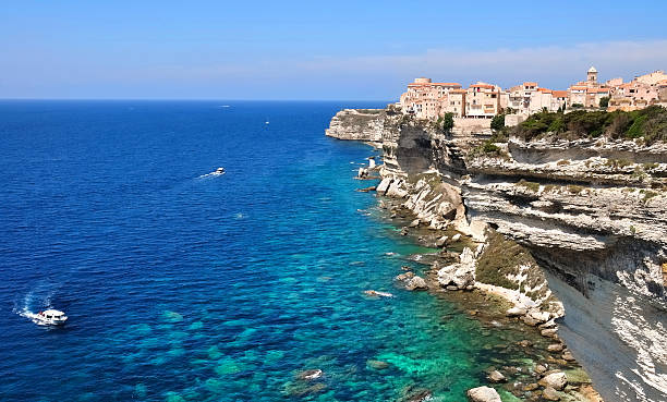 A beautiful coast of the Mediterranean sea Village perched atop a limestone cliff on the Mediterranean coast (Bonifacio) bonifacio stock pictures, royalty-free photos & images