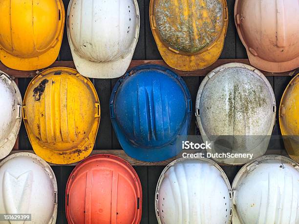 Old Used Construction Helmets Stock Photo - Download Image Now - Hardhat, Construction Industry, Work Helmet