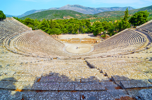 The Ancient Theatre of Epidaurus is situated within the archaeological site of the Sanctuary of Asklepios, Peloponnese, Greece