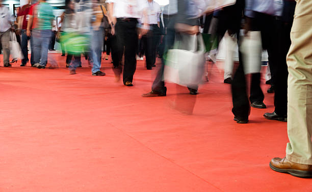 istock Pedestrians walking on a red carpet 151631618