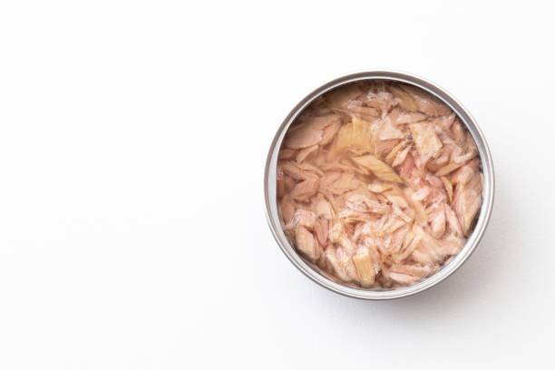 istock Canned tuna on white background 1516324390