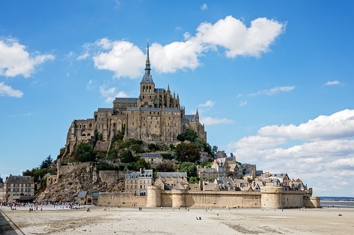Panorama of Mont Saint Michele abbey in a beautiful summer day, France.