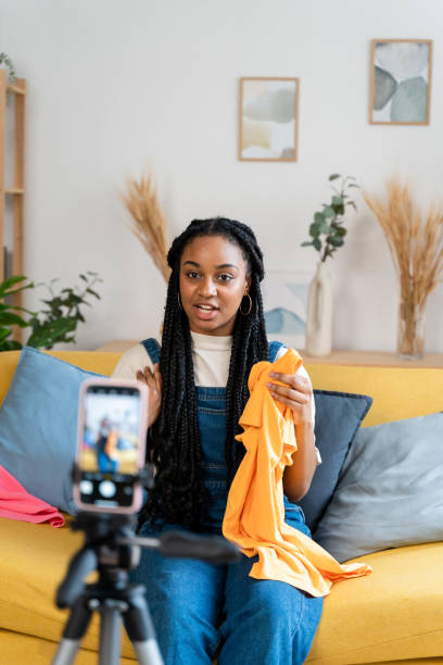 istock Female streamer broadcasting live from home. 1516332998