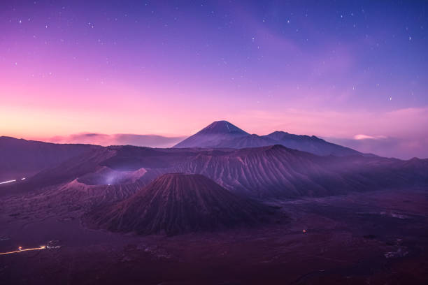 istock Mount Bromo is an active volcano and foggy with starry at East Java, Indonesia 1516339393