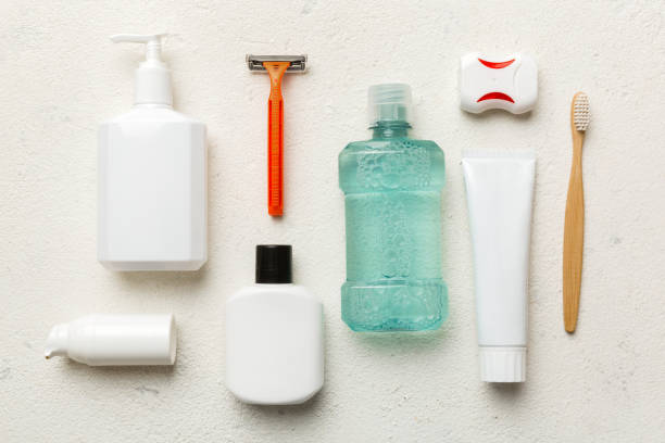 istock Mockup for bathing products top view flat lay, spa razor, toothpaste, soap, gel and other various accessories. Cosmetics for skin health. Bath Mockup for your logo 1516341352