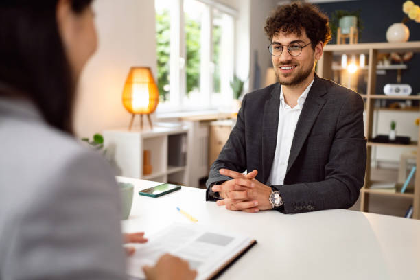 istock Unrecognizable female recruiter Japanese ethnicity interview male candidate 1516381913