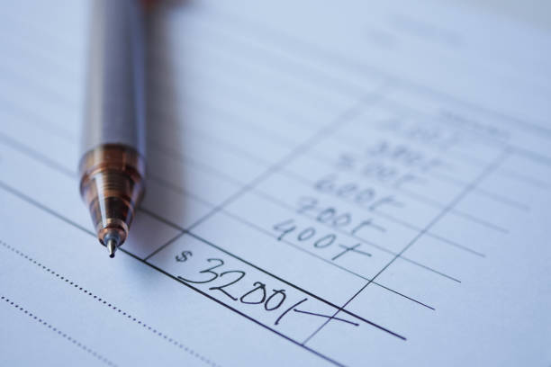 istock A man writes payment due in a paper form 1516386527