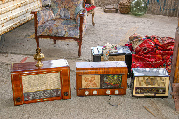 used radio and armchair - antique furniture old old fashioned imagens e fotografias de stock
