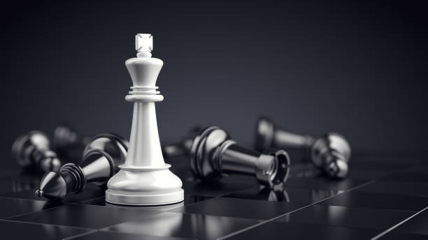 istock Chess king on chess board game with defeated chess figures. Success strategy busines concept. 3d rendering 1516444734