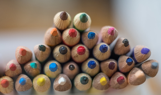 Color pencil is an art medium created from a tiny pigmented core encased in a wooden cylindrical shell like a pencil.