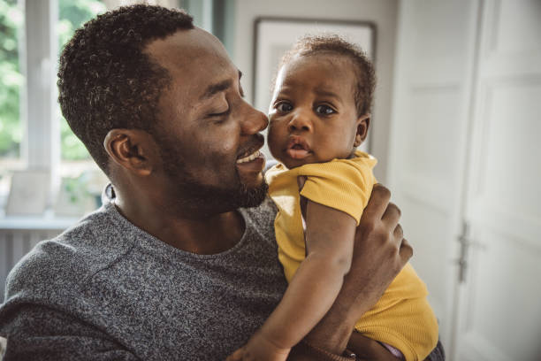istock Father holding his baby 1516482943