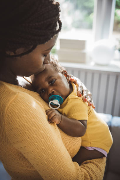 istock Mother and baby at home 1516485042
