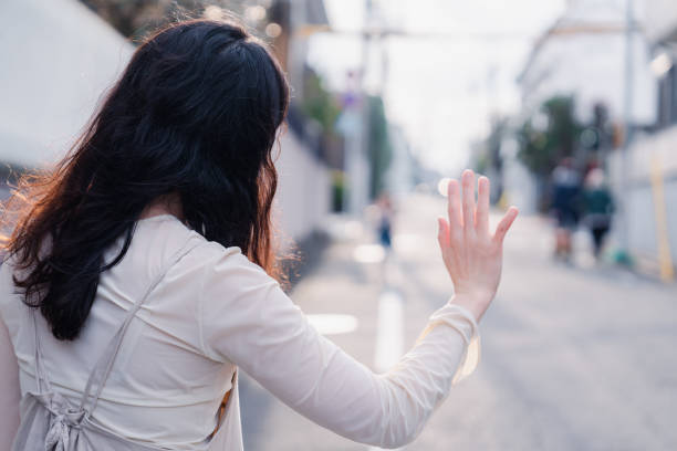 istock A mother picking up her child outside 1516536734