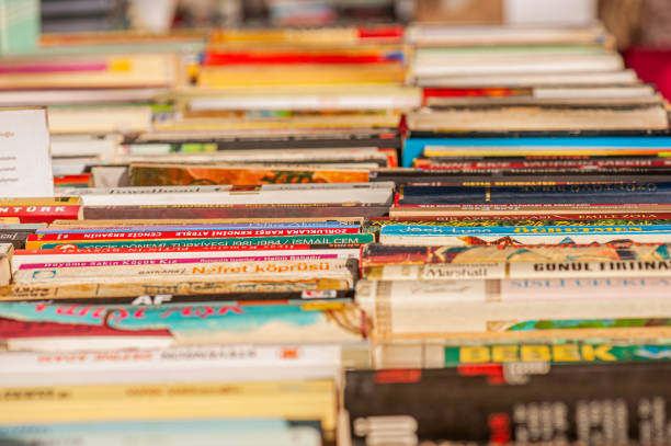 Ankara, Turkey - April 6, 2014: Ayrancı Antique Bazaar, which opens in the Ayrancı district on the first Sunday of every month in Ankara. Second hand books by Turkish authors - Front and background blur