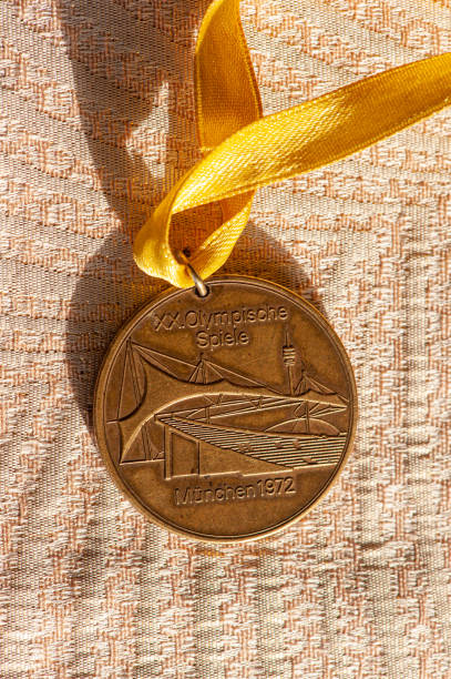 Ankara, Turkey - April 6, 2014: Ayrancı Antique Bazaar, which opens in the Ayrancı district on the first Sunday of every month in Ankara.\n\nThe 1972 Summer Olympics (XX Olympic Games) were held from 26 August to 11 September 1972 in Munich, West Germany. A bronze medal from those years was put up for sale in the antique market.