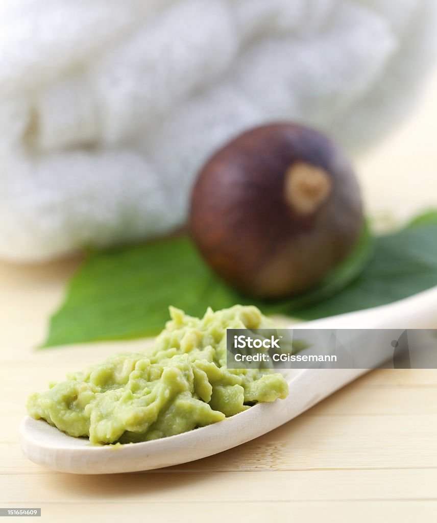 avocado mask avocado mask on wooden spoon Avocado Stock Photo