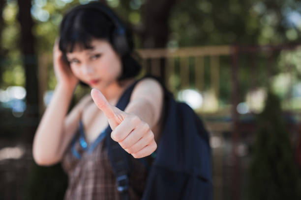 Girl listening to music and gesturing