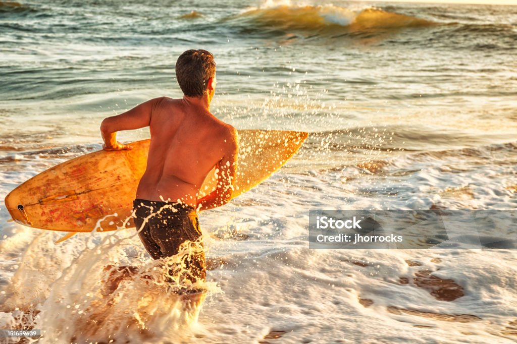 Atardecer surfista - Foto de stock de Naranja - Color libre de derechos