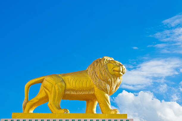 istock lion statue Roman style on sky background 151659904