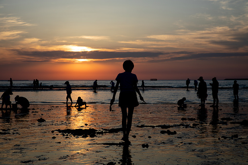 Salvador, Bahia, Brazil - April 13, 2019: Tourists are seen enjoying the sunset at Ponta do Humaita in the city of Salvador, Bahia.