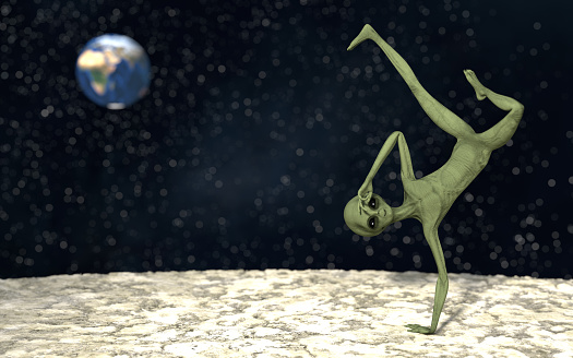 Alien posing upside down on his planet with the Earth on the background