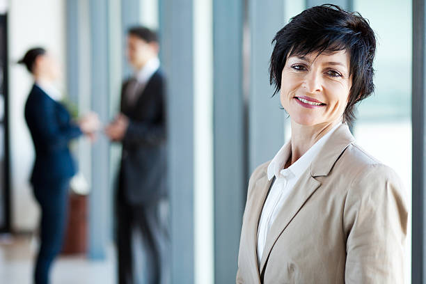 istock middle aged businesswoman in office 151662137