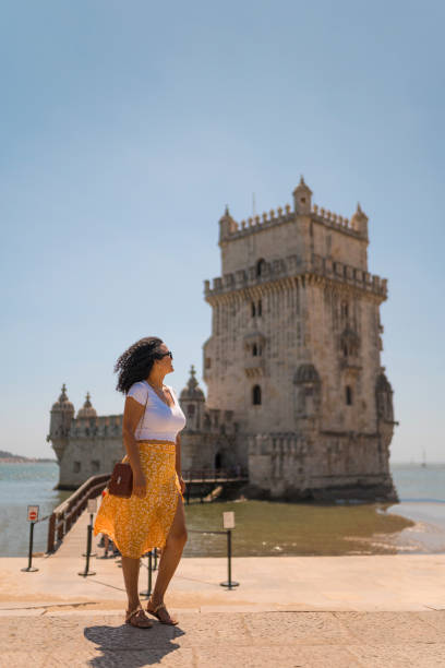 istock Tourist looking at Belem Tower 1516637988