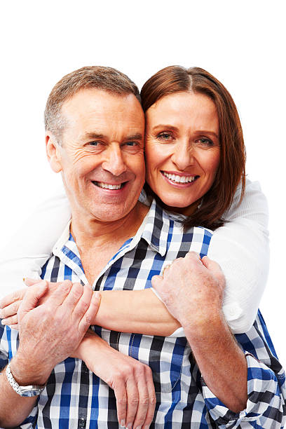 istock Mature couple isolated on white background hugging 151665177