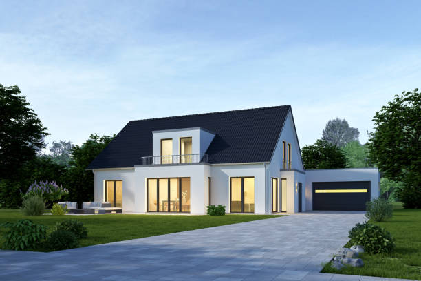 istock modern house with a cubic extension and garage in the evening 1516664368