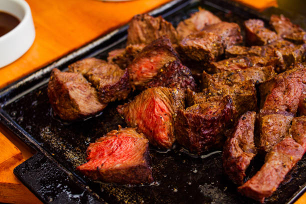 istock Barbecue Meat Board Served With Beef Shoulder And Side Sauces 1516694107