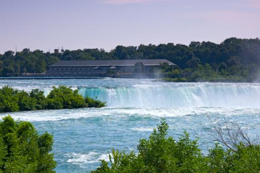 Power generating station operated by Canadian Niagara Power at Queen Victoria Park area of Niagara Falls in Ontario Canada with Horseshoe Falls in foreground