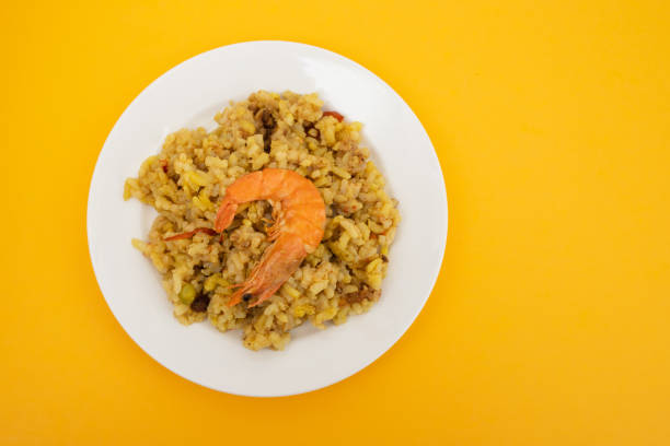 istock Mixed rice with seafood on small white dish 1516711332