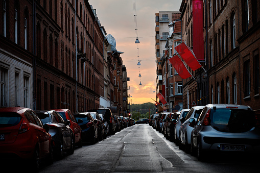 Cityscape at dusk. One way Street in residential district in Odense \