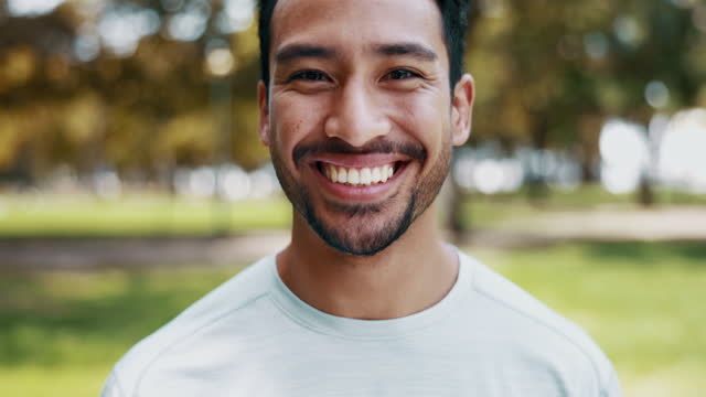 Park fitness, smile and face of happy man ready for cardio exercise running, outdoor marathon training or health wellness. Portrait person, nature happiness and sports athlete for workout challenge