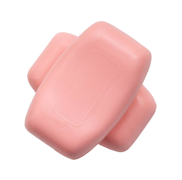 istock Two dry pink soap bars in stack isolated on white background with clipping path. 1516797899