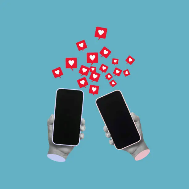 Photo of Two mobile phones with like symbols from social networks in male and female hands. Dating site