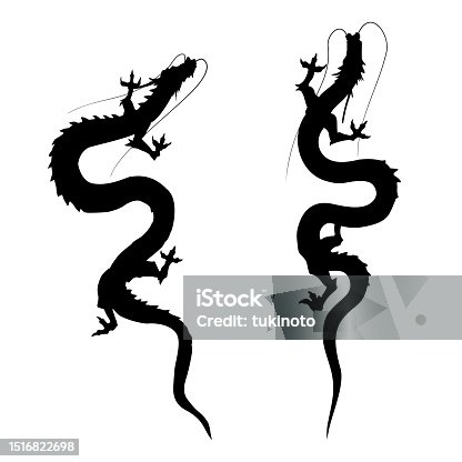 istock Silhouette of dragon rising to the sky 1516822698