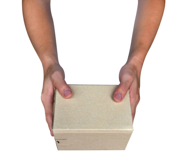 istock Hand holding paper box give gift isolated on white background,clipping path 1516832080