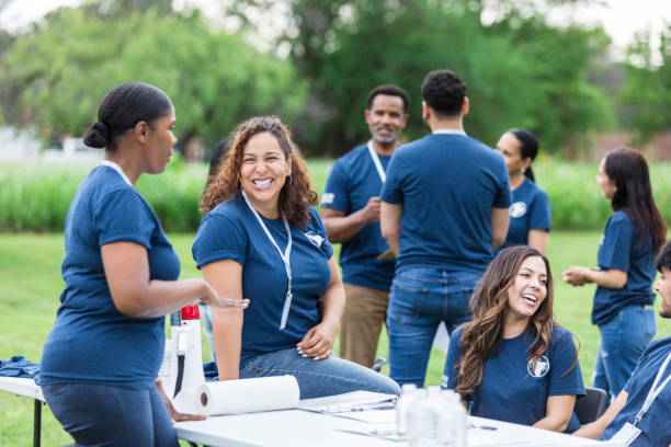 istock Before participants arrive, diverse volunteers get to know each other 1516845975